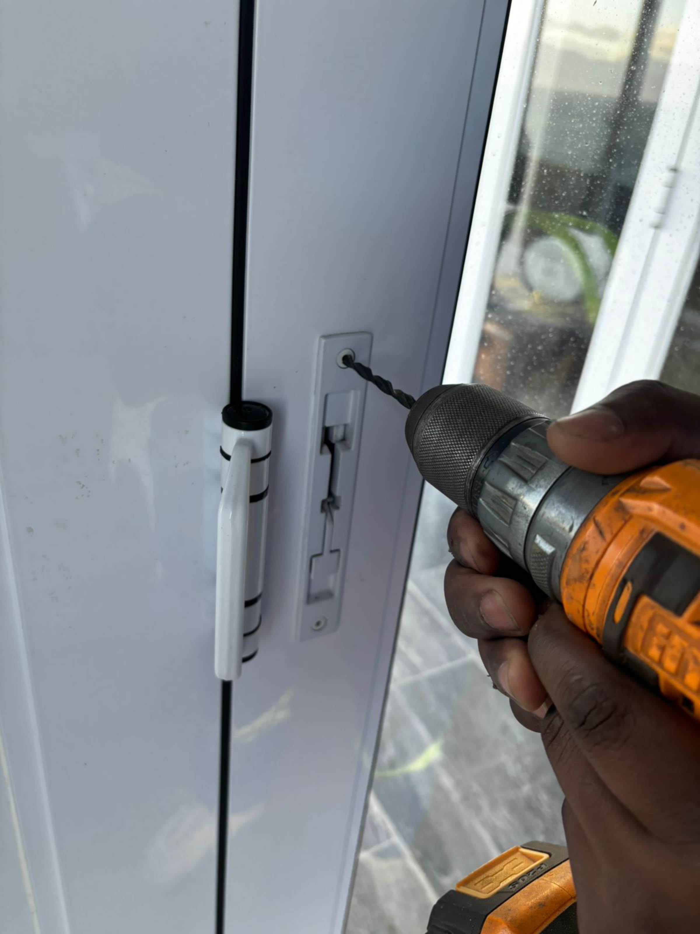 Drilling out the existing top rivet with a 5 mm drill bit