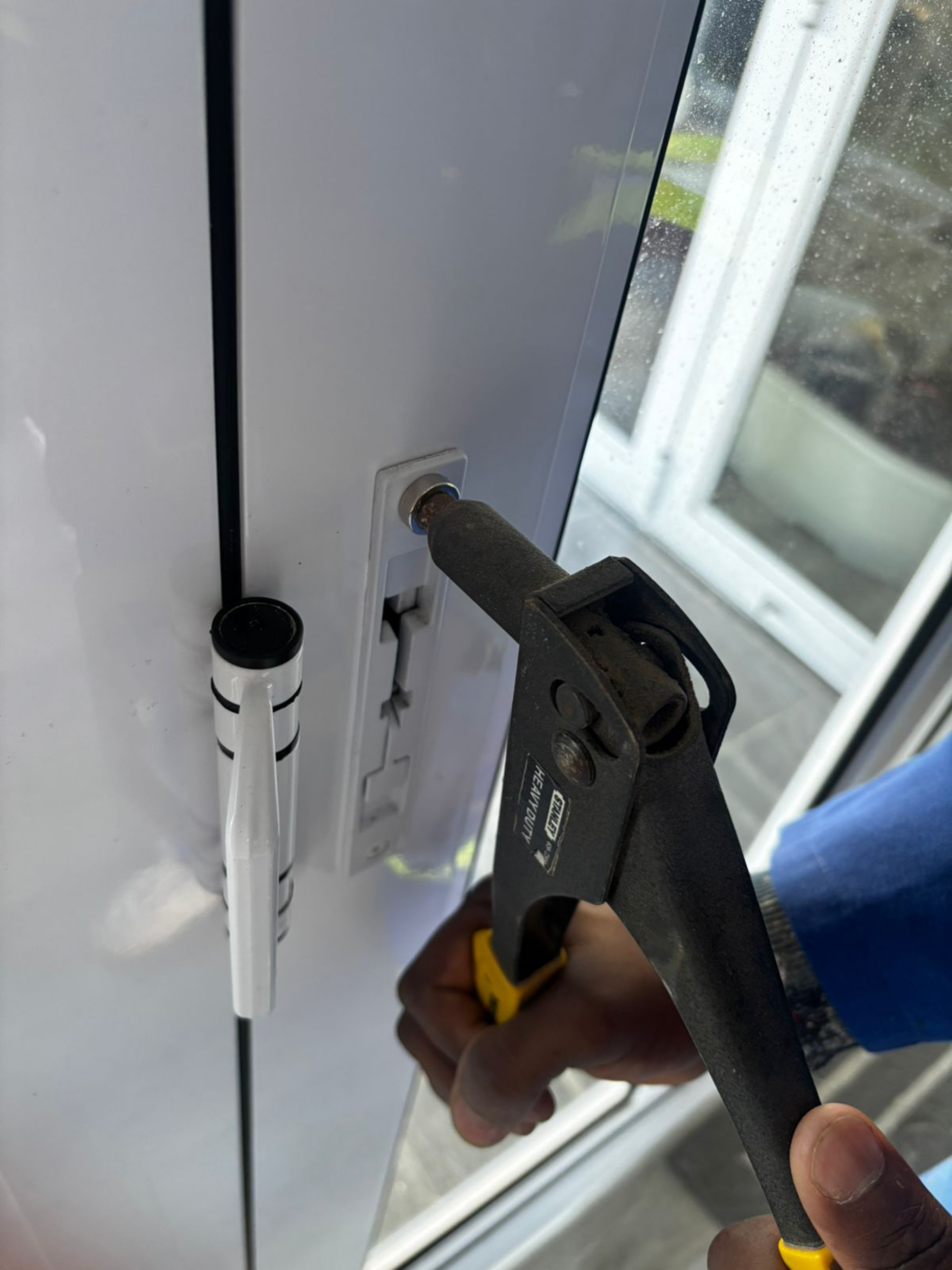Installing the countersunk rivet and magnet using a rivet gun