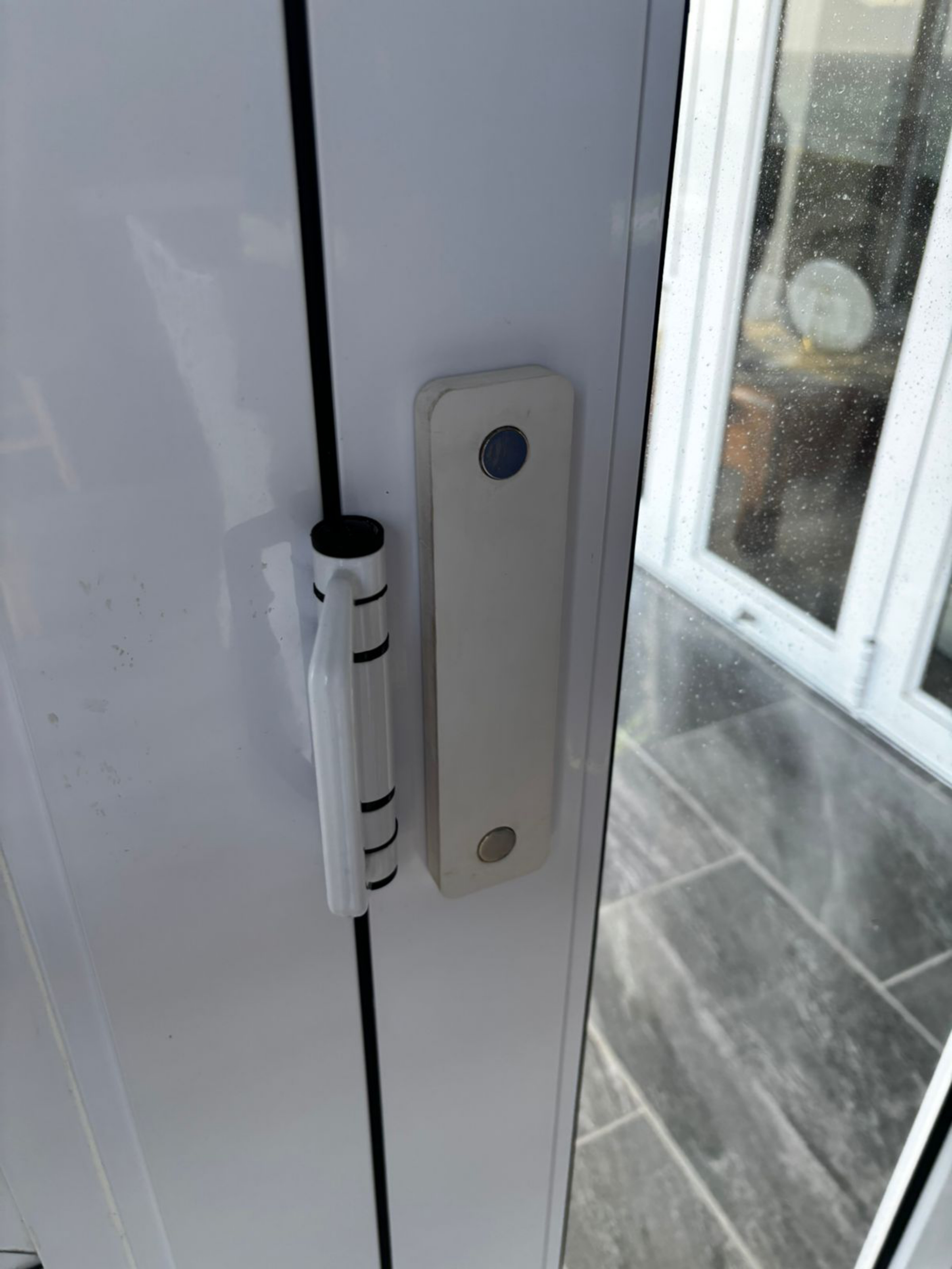 WindSeal installed on aluminium door latch opening